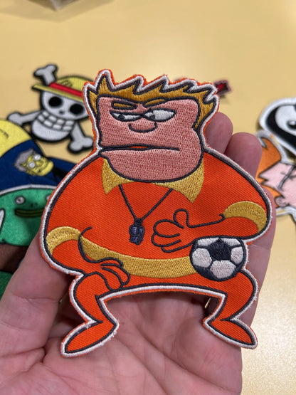 Coach McGuirk Patch – 4.8 Inch Iron On 90s Cartoon